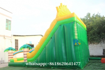 green inflatable water slide