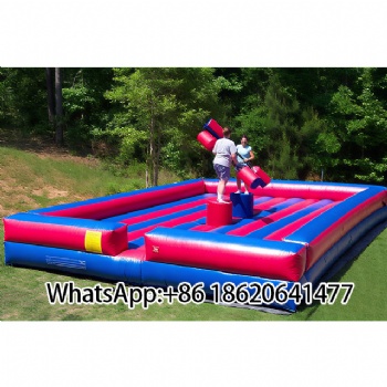 Outdoor Inflatable Combat Zone: Pillar - Based Dueling Fun with Padded Weapons