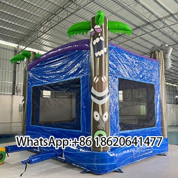 Inflatable Bounce Structure with Elaborate Tiki - Style Totem Head Ornaments